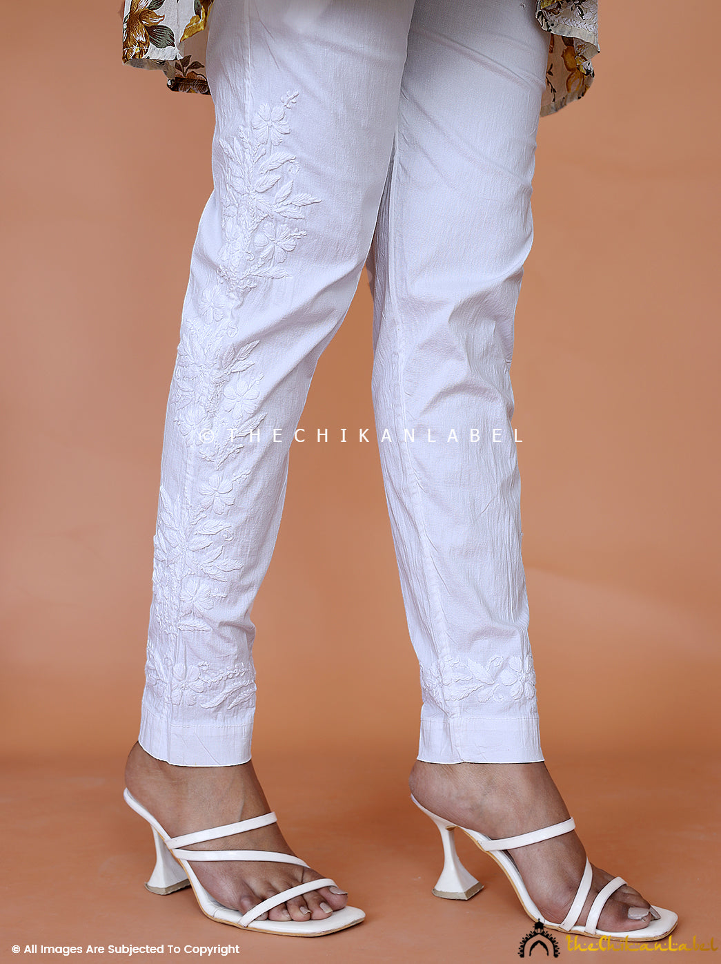 White Aqsa Side Work Chikankari Pant, Shop now from a collection of chikankari cigarette pants at Thechikanlabel, Buy lucknow chikankari straight cigarette pants online at best price.